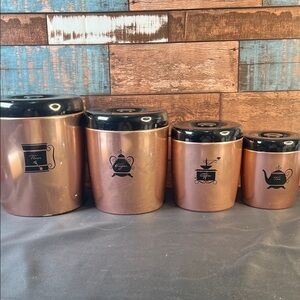Can West Bend set of 4 Copper colored w/ black lids Canister set made in USA